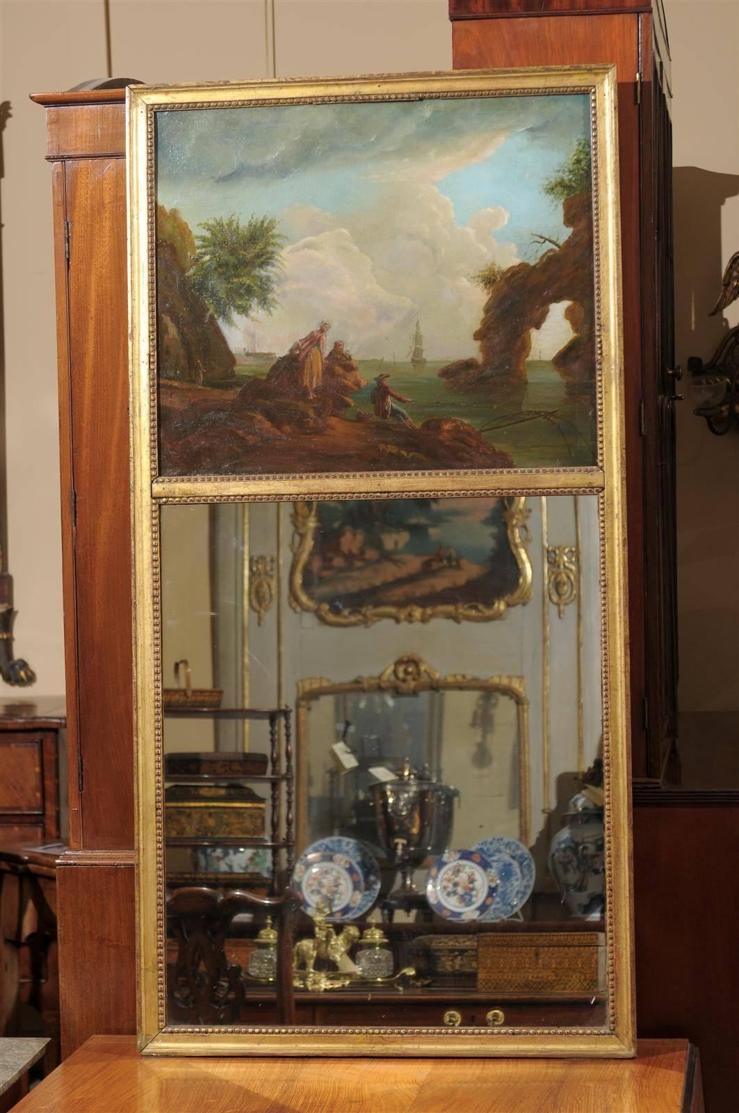 A Continental neoclassical style trumeau mirror with oil on canvas landscape painting and giltwood frame. 