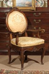 Italian 18th Century Walnut Armchair with Scrolled Arms