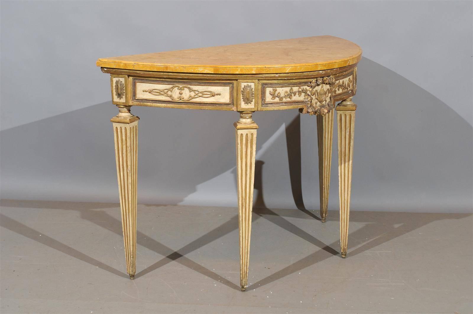 A pair of painted & parcel gilt Neoclassical consoles with sienna marble tops. 

To view all our inventory, please visit our personal website. 

William Word Fine Antiques: Atlanta's source for antique interiors since 1956. 


