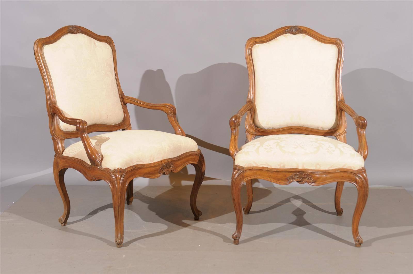 Pair of 18th century walnut armchairs from Genoa, Italy.