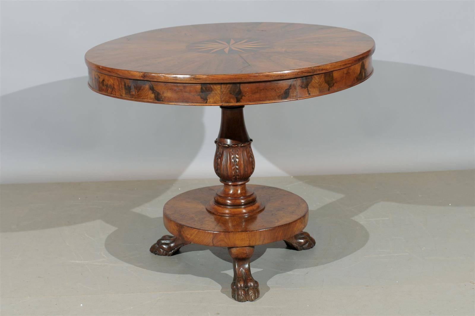 Italian walnut gueridon with inlay, 4 drawers, pedestal base and paw feet. 

To view all our inventory, please visit our personal website. 

William Word Fine Antiques: Atlanta's source for antique interiors since 1956. 
