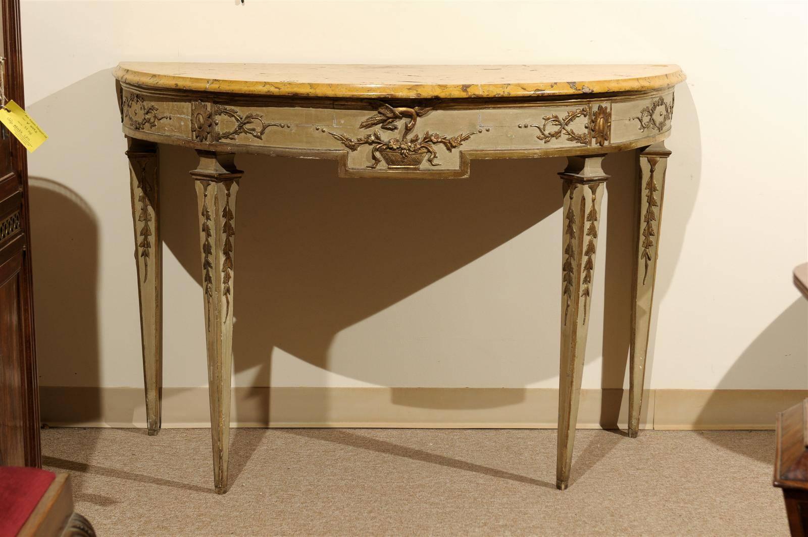 A large 18th century Italian neoclassical painted and parcel gilt console with sienna marble top.