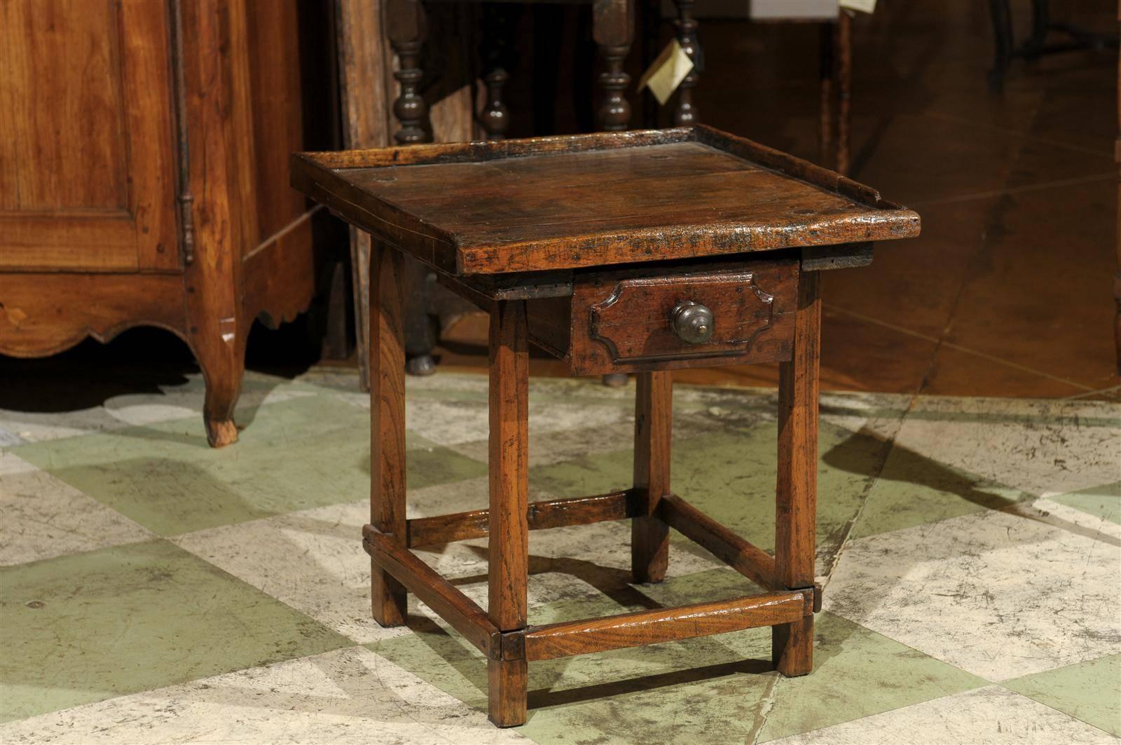 A low pine shoe maker table with drawer and stretcher. 

