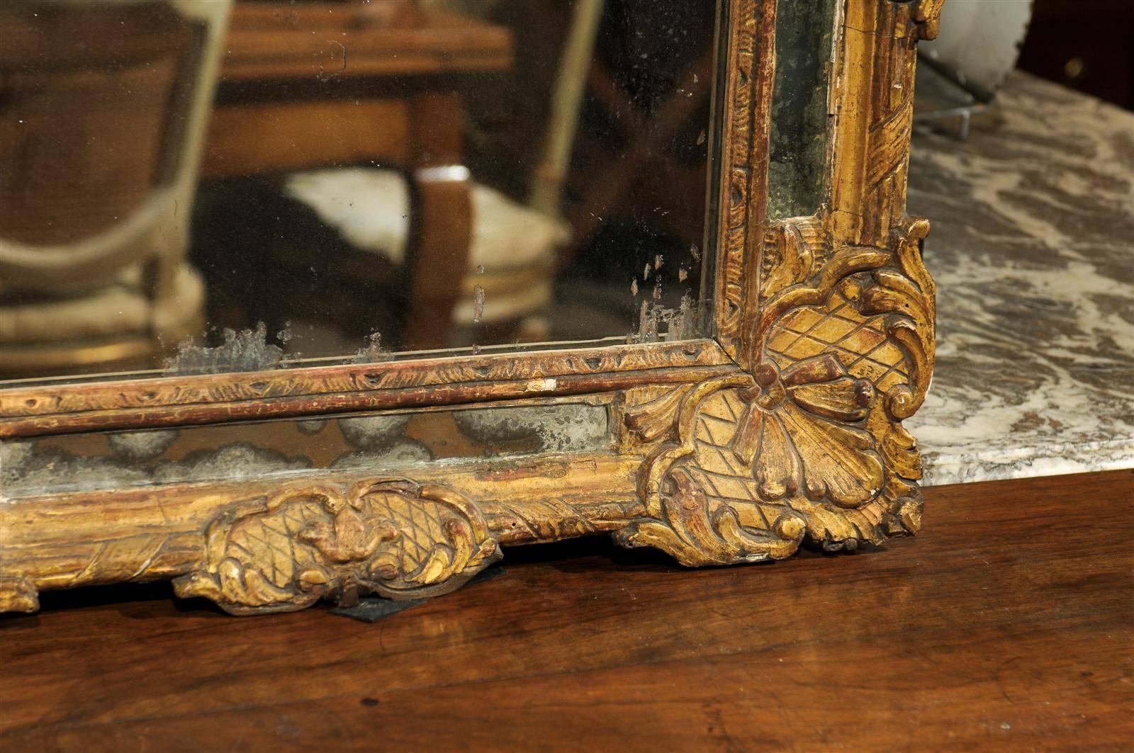 Early 18th Century French Giltwood Mirror with Flower Carving 5