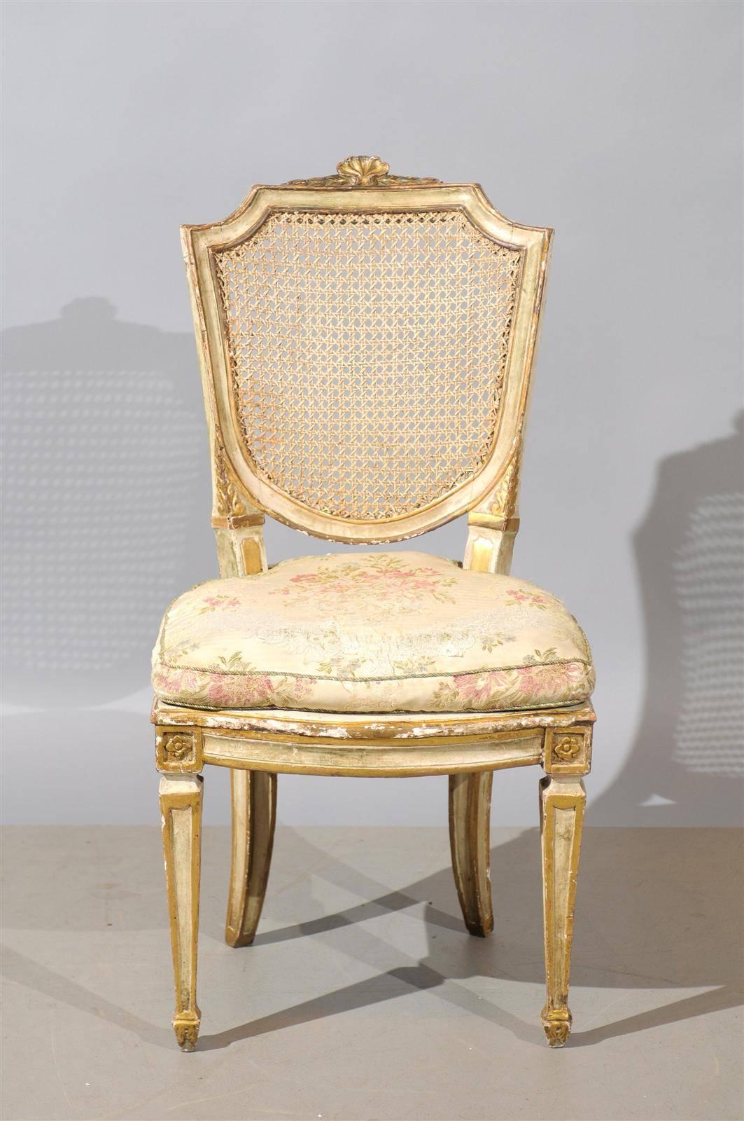 Set of six 19th century Italian neoclassical style painted and cane dining chairs. Also, can be sold in pairs. 

To view all our inventory, please visit all our inventory. 

William word fine antiques: Atlanta's source for antique interiors