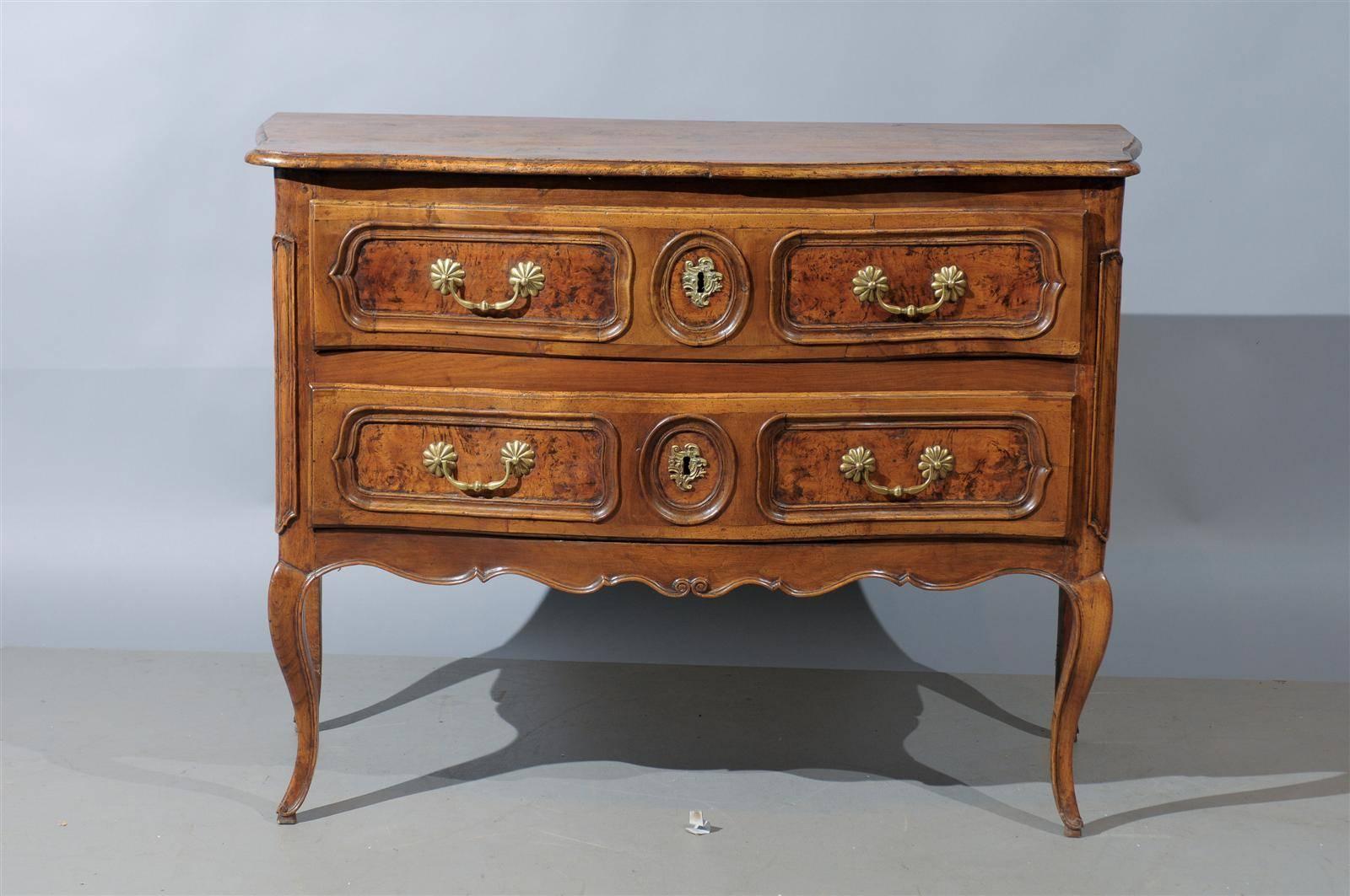 18th century French Louis XV walnut two-drawer commode with burled walnut panels & saber legs, Bresse, circa 1760. 

.