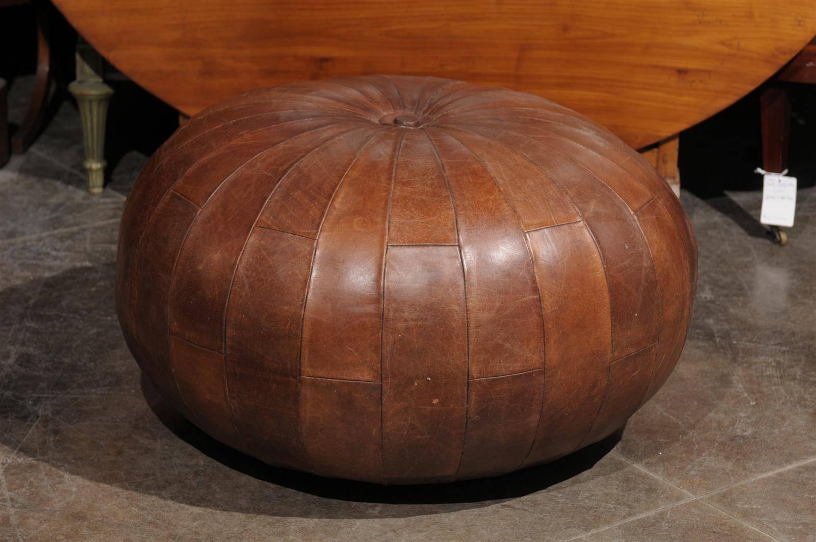Leather pouf or ottoman.