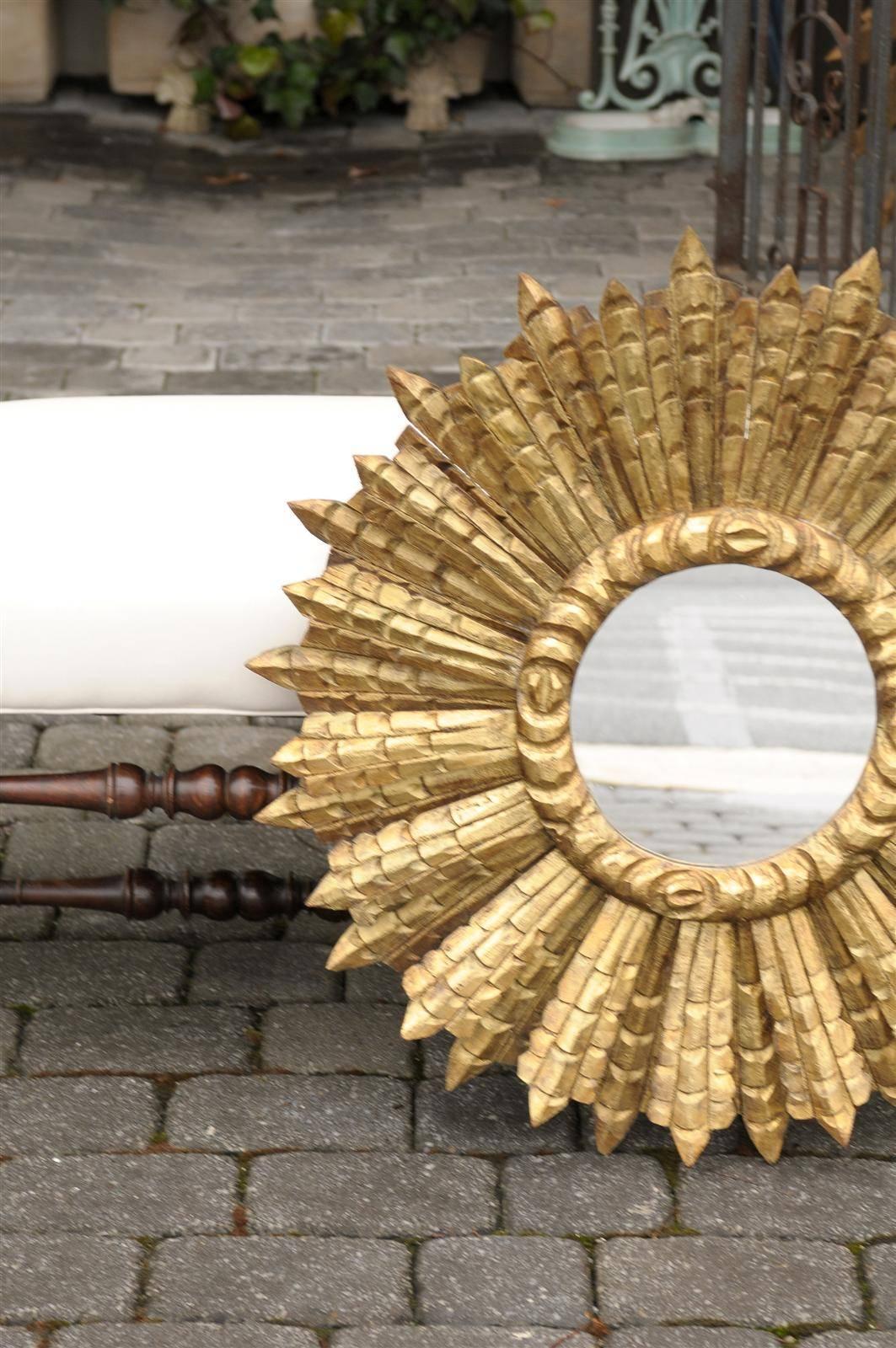 French Large Vintage Giltwood Sunburst Mirror with Sunrays of Variating Sizes In Excellent Condition In Atlanta, GA