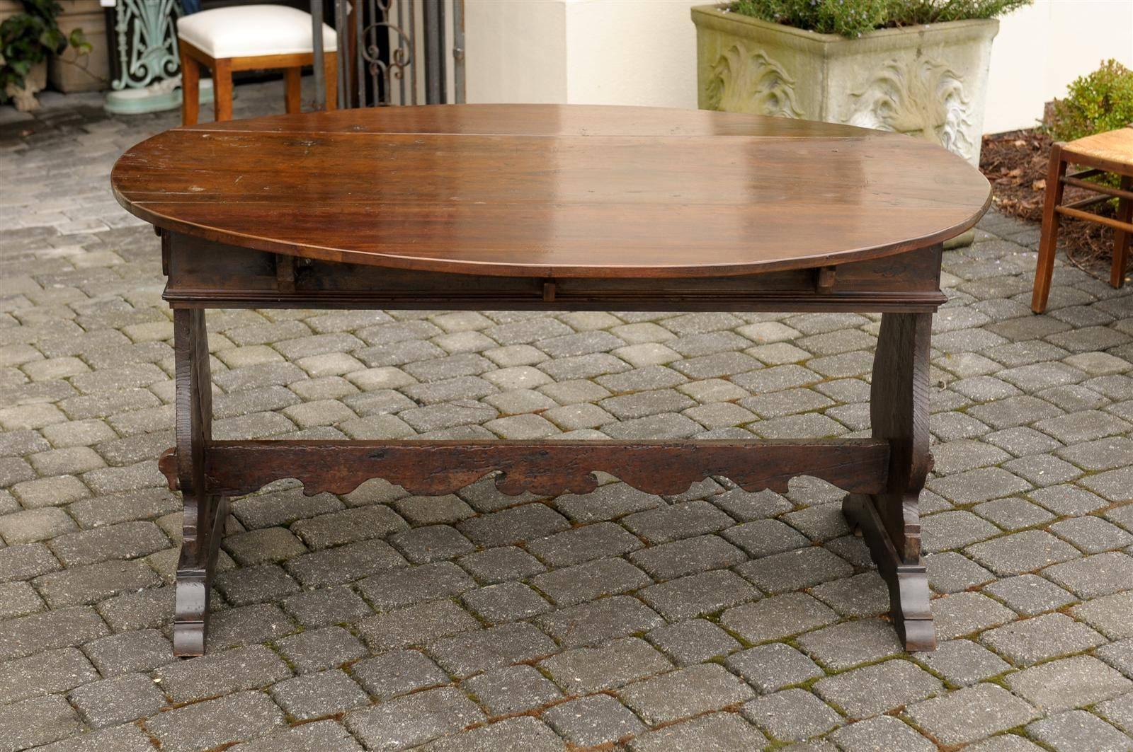 Oval Italian Walnut Drop-Leaf Table from the Late 18th Century with Trestle Base 3