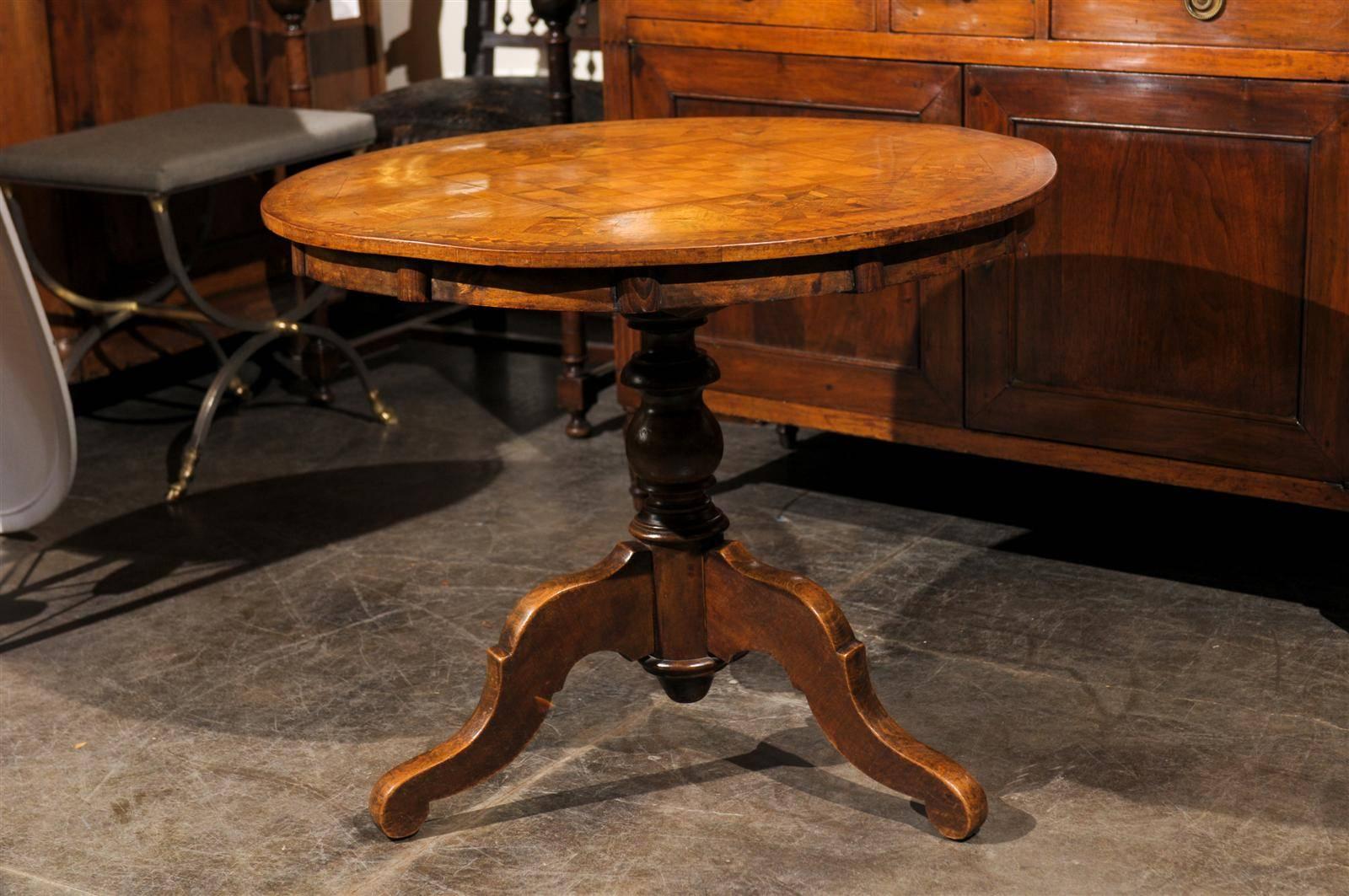 Round Italian pedestal table with inlay.