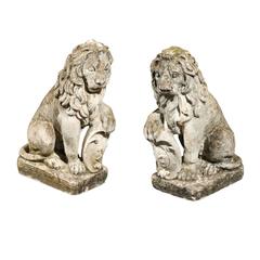 Pair of French Mid-20th Century Seated Stone Lions with Shields and Fleur-de-Lys