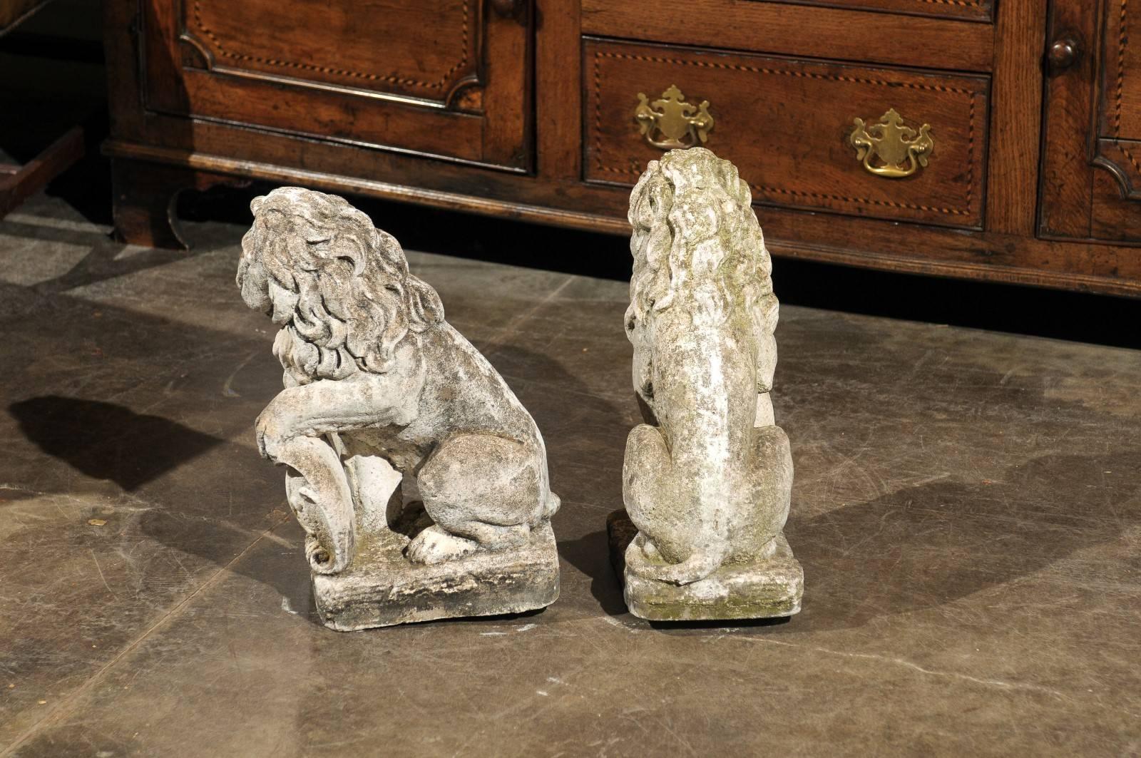Pair of French Mid-20th Century Seated Stone Lions with Shields and Fleur-de-Lys In Excellent Condition In Atlanta, GA