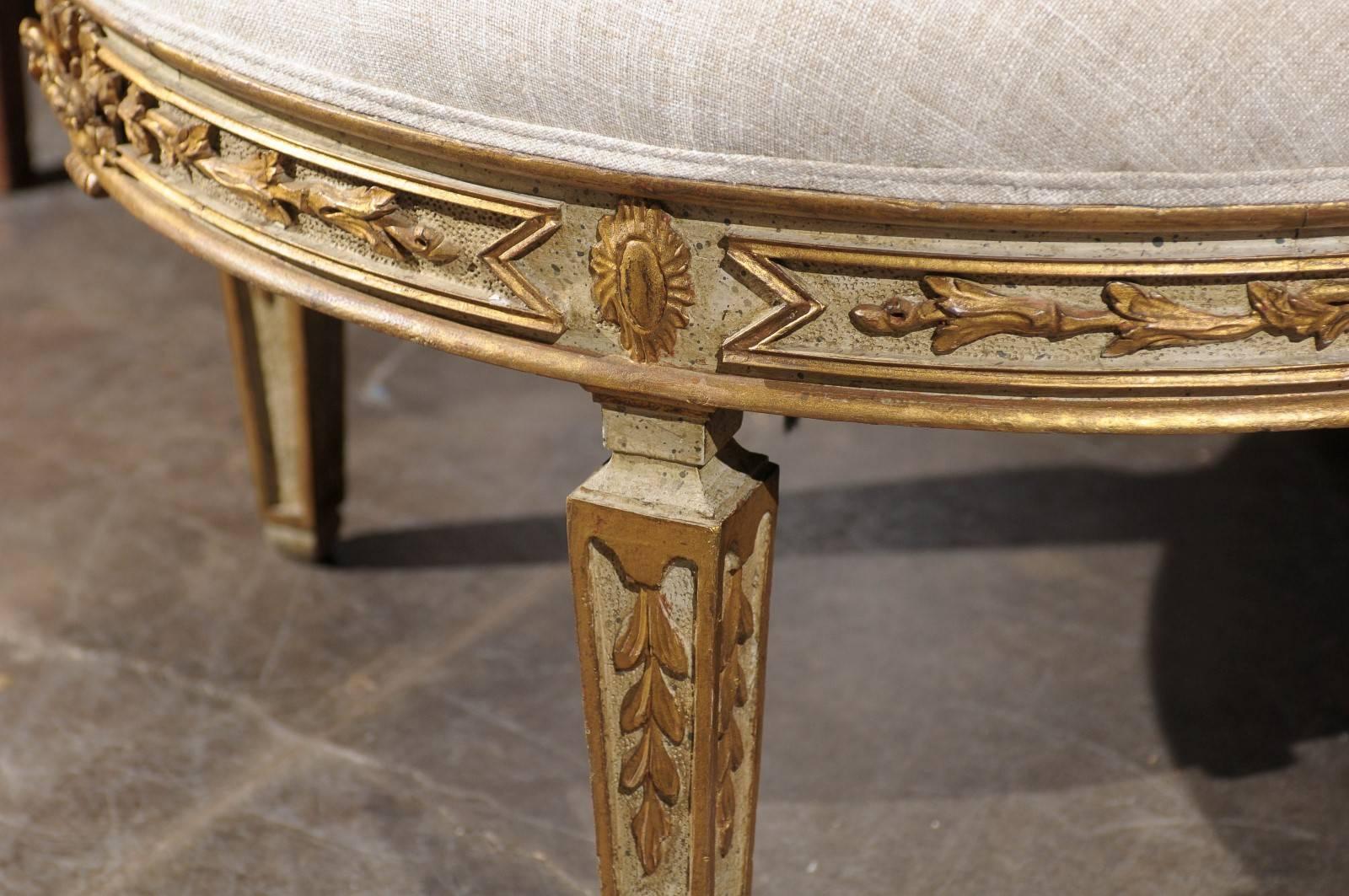 Italian Neoclassical Style Upholstered Round Ottoman with Giltwood Motifs 3