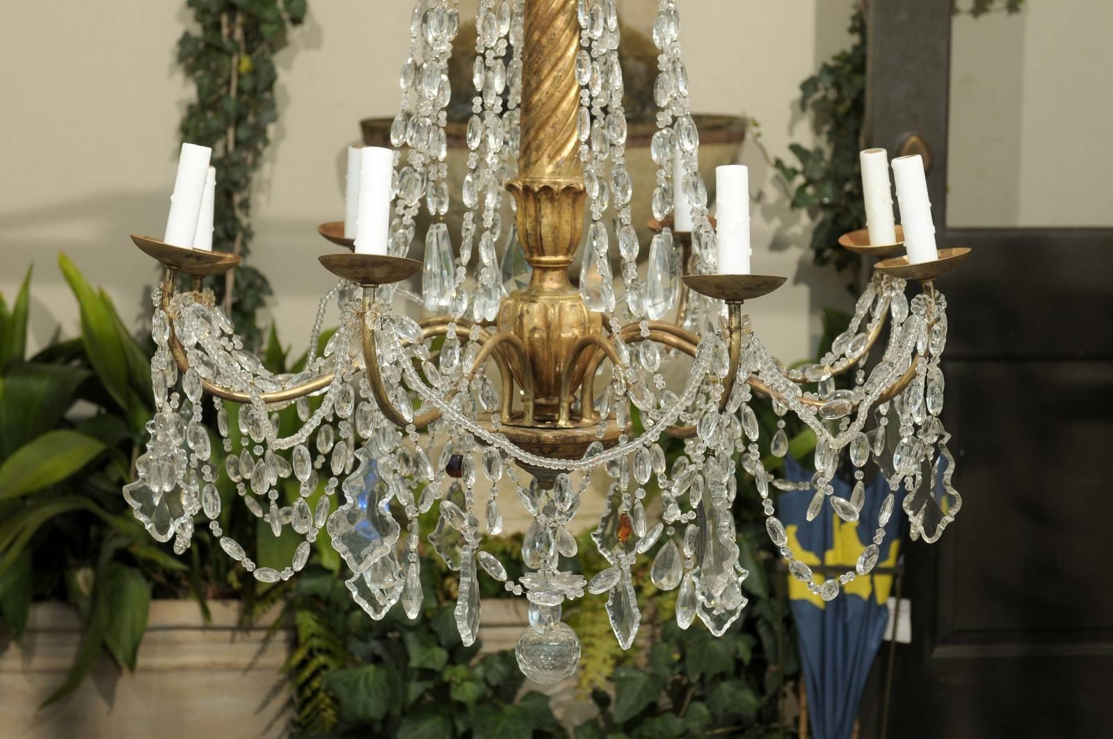 Italian Eight-Light Crystal and Giltwood Chandelier from the Early 20th Century 3