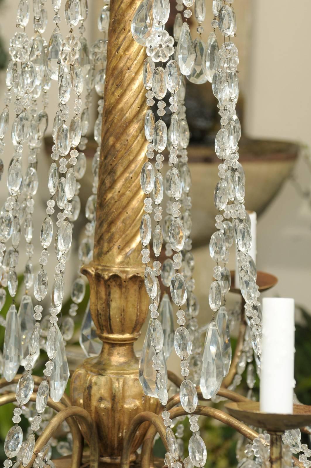 Italian Eight-Light Crystal and Giltwood Chandelier from the Early 20th Century 7