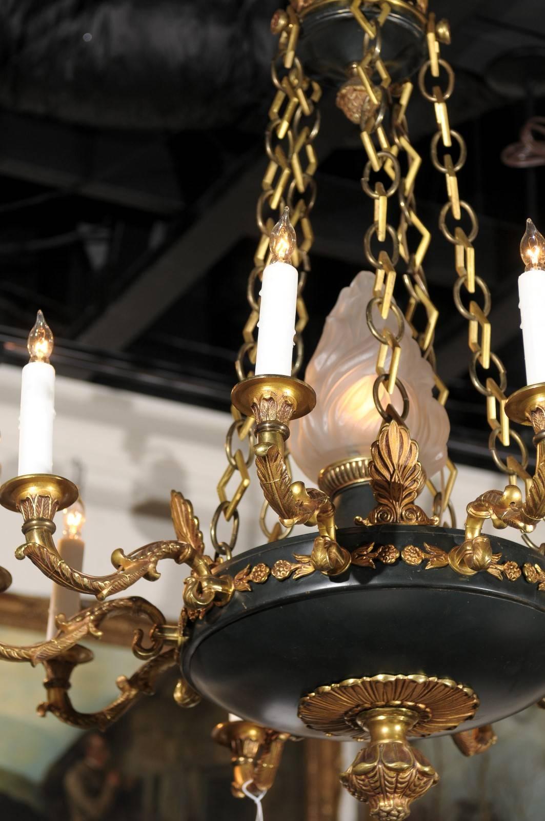 20th Century French 1920s Empire Style Ten-Light Chandelier with Central Frosted Glass Flame