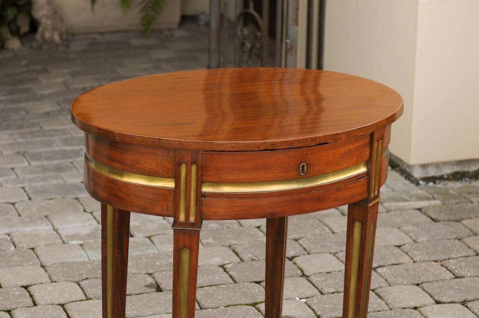 19th Century Russian 19th century Mahogany Oval Side Table with Brass Inlaid Elements 
