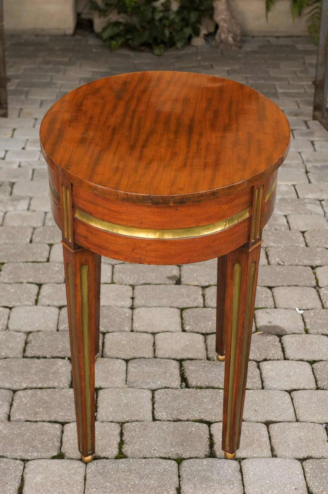 Russian 19th century Mahogany Oval Side Table with Brass Inlaid Elements  1