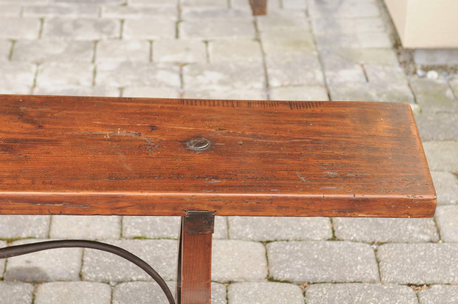 Spanish Late 19th Century Long Wooden Bench with Iron Stretcher 2