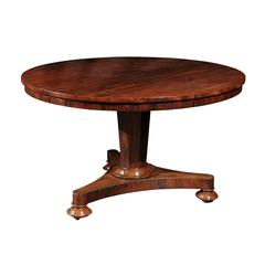 English Mid-19th Century Round Rosewood Pedestal Center Table with Tilt Top