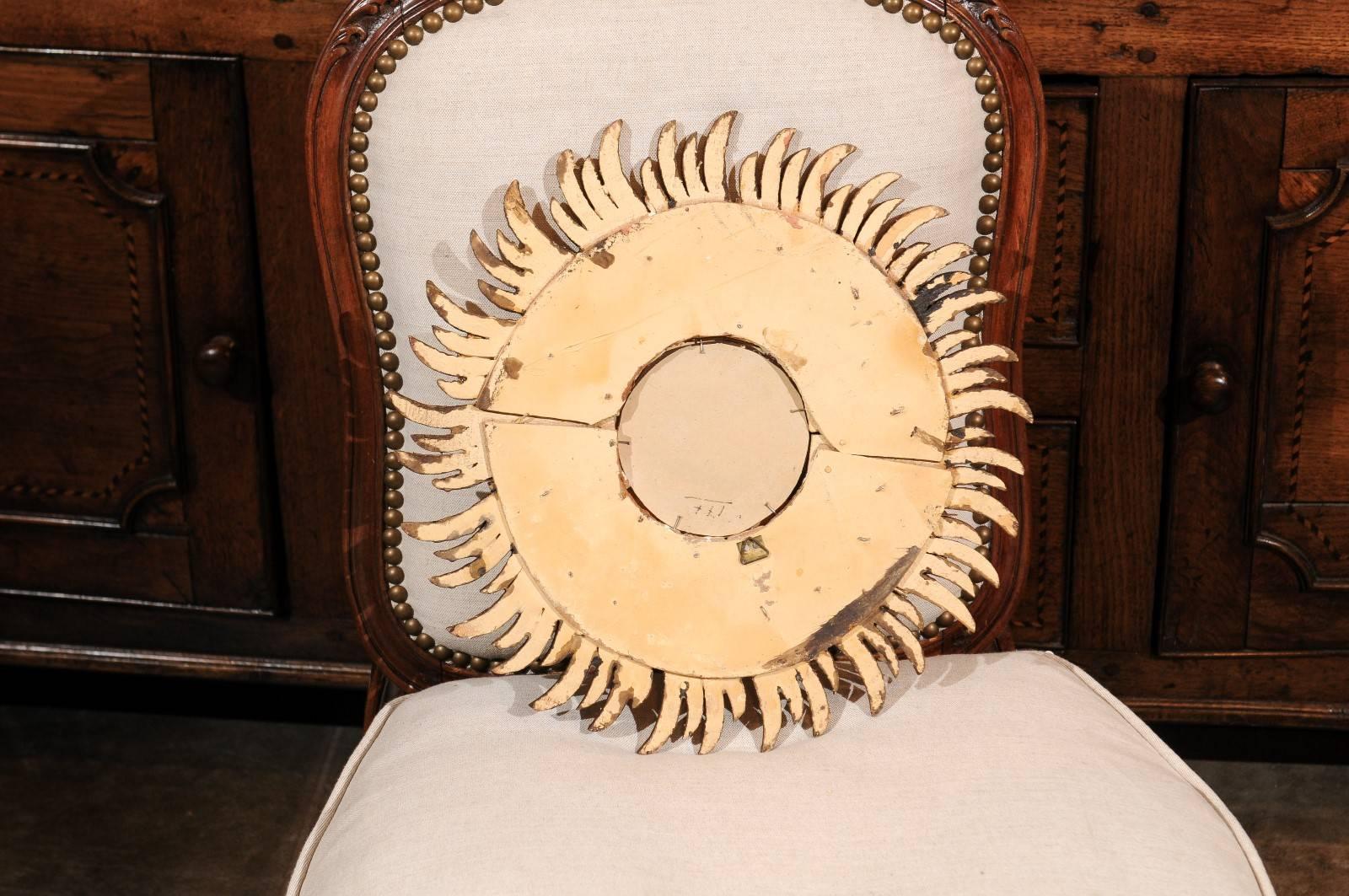 French Giltwood Sunburst Mirror with Wavy Sunrays from the Mid-20th Century 1