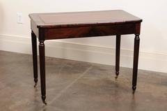 English Mahogany Desk on Casters with Brown Leather Top over Two Drawers, 1850s