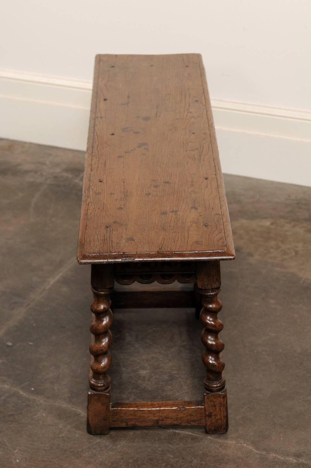 English Backless Carved Oak Bench with Barley Twist Legs, circa 1920 1