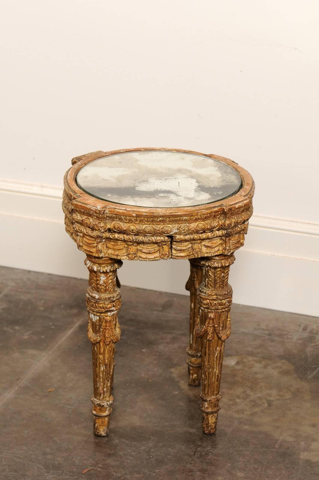 Italian Mid-18th Century Giltwood Table with Mirrored Top over Four Carved Legs 4