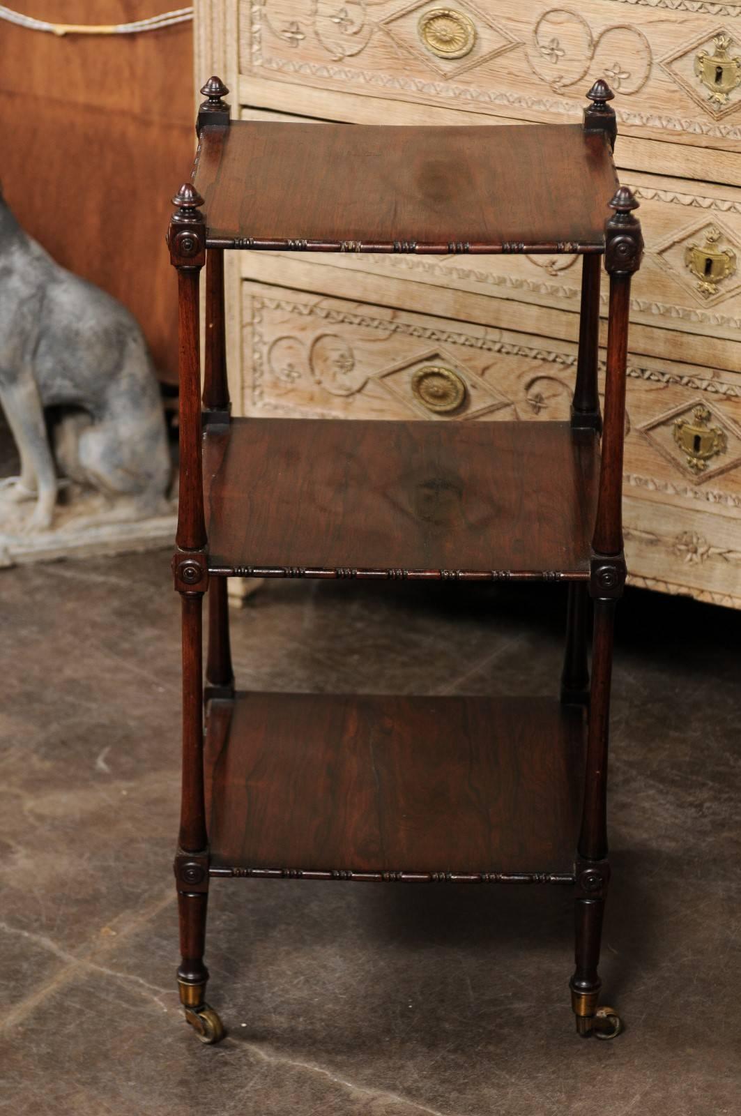 English 1850s Rosewood Three-Tiered Trolley with Carved Side Posts and Casters For Sale 1