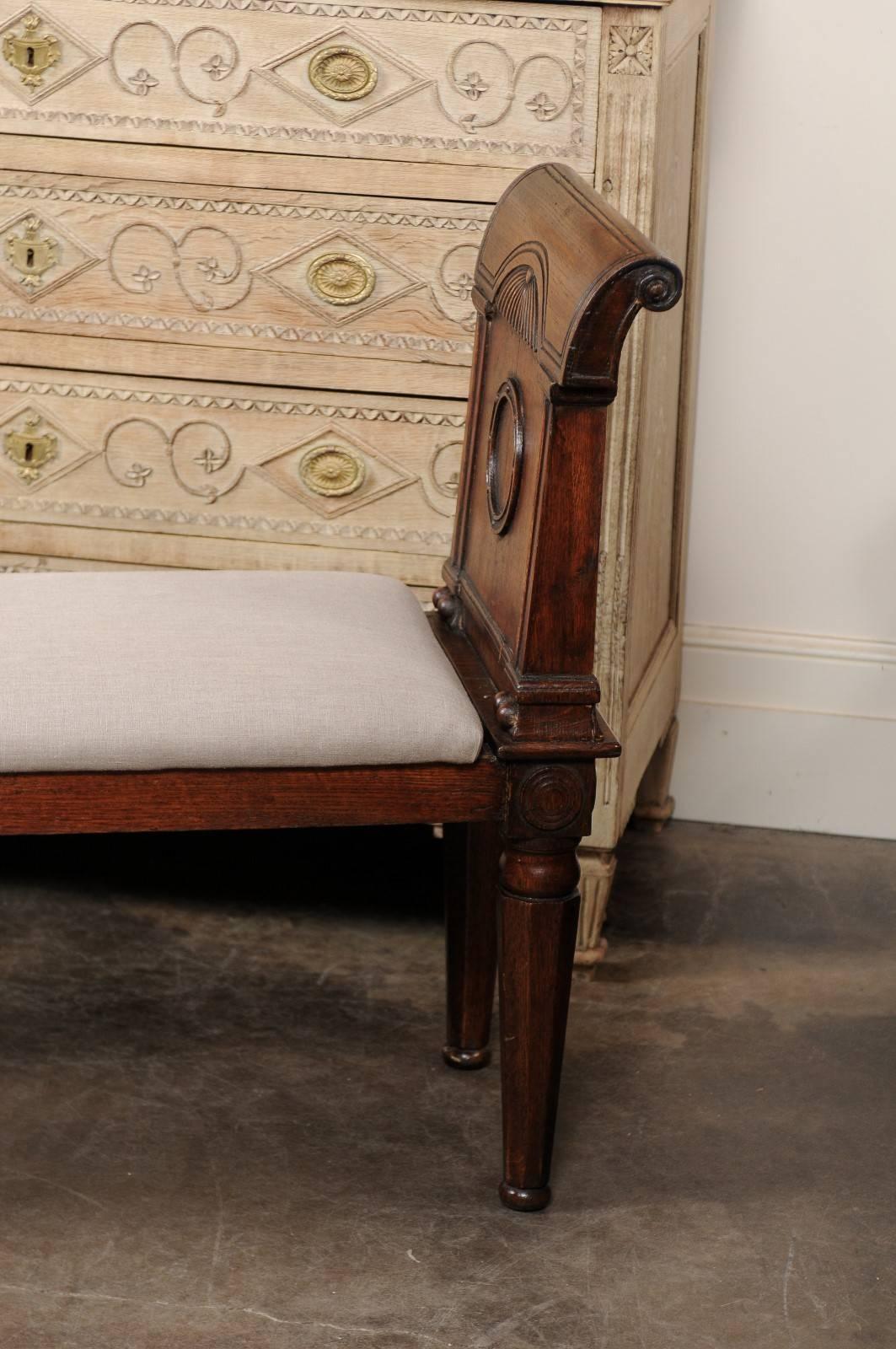 19th Century English, 1880s Oak Backless Bench with Out-Scrolled Arms and Upholstered Seat For Sale