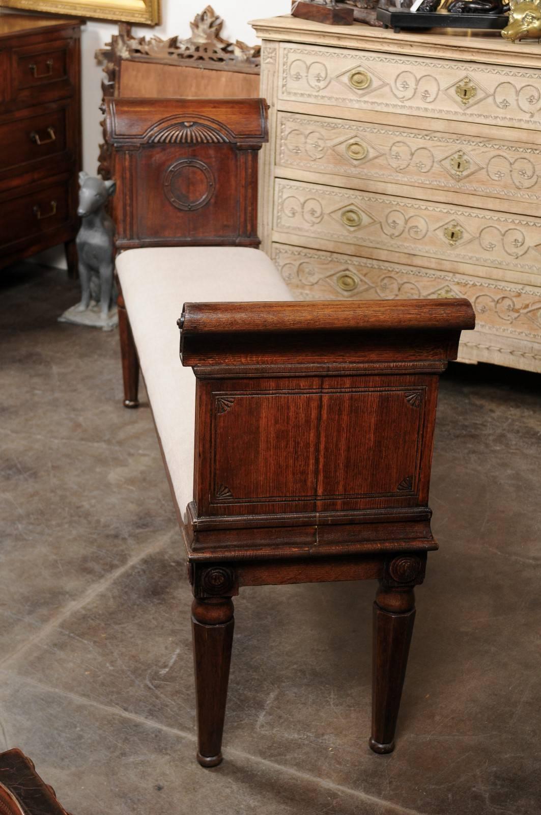 Upholstery English, 1880s Oak Backless Bench with Out-Scrolled Arms and Upholstered Seat For Sale