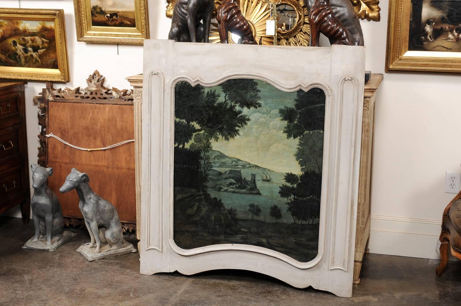 This French trumeau painting from the late 19th century features a vertical painted frame with discrete carved molding on the sides, and a beautifully executed painted scene in the centre. The color of the piece is reminiscent of a technique
