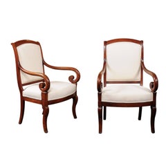 Pair of French Mid-19th Century Empire Style Walnut Fauteuils with Volute Arms