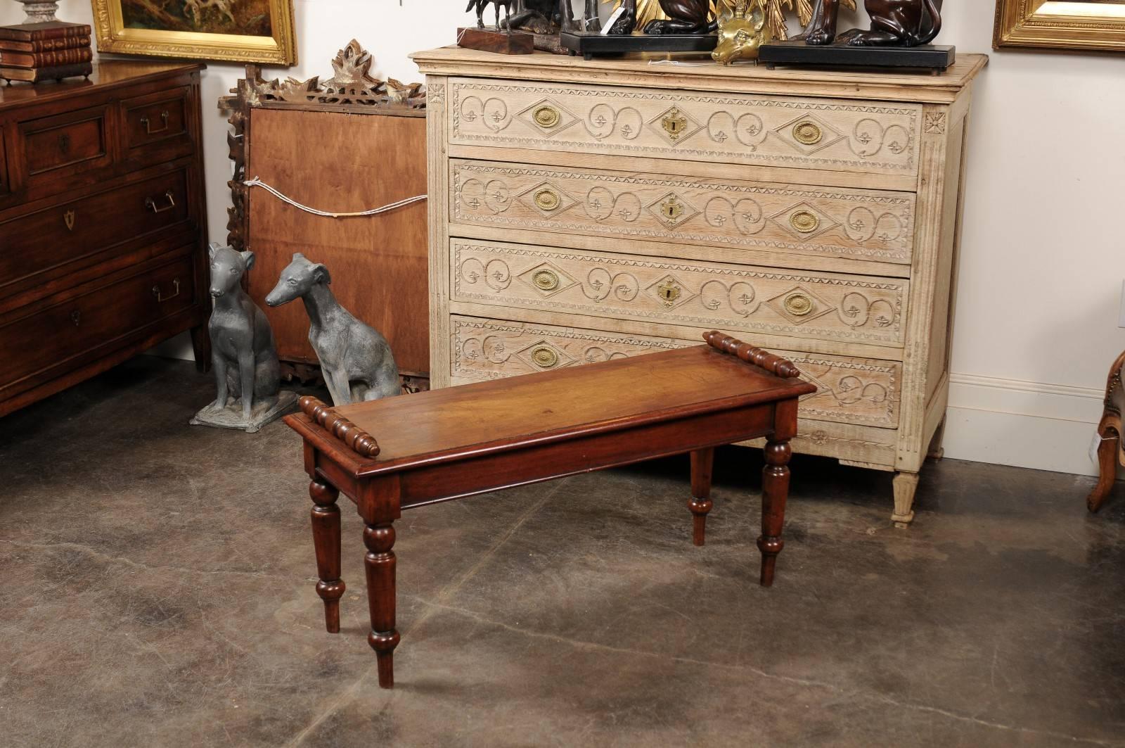 Carved English 1880s Mahogany Hall Bench with Wooden Seat, Turned Arms and Legs