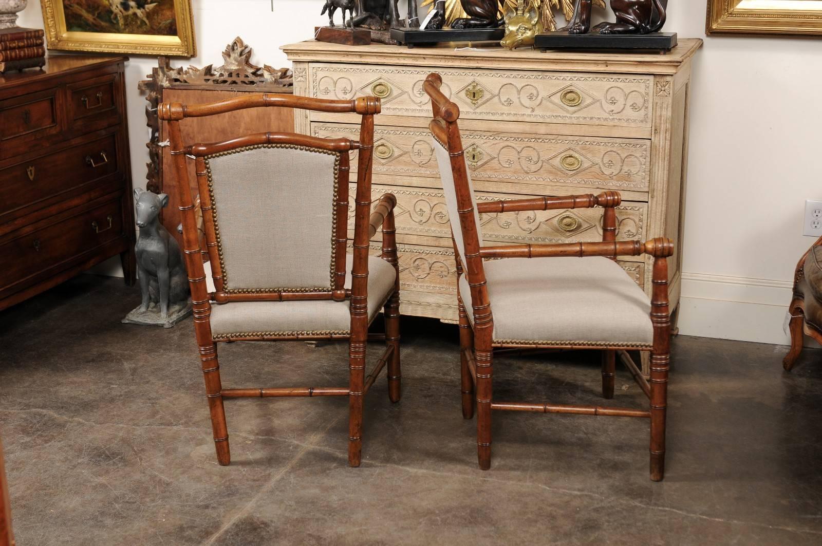 Upholstery Pair of English 1900s Faux-Bamboo Armchairs with Turned Legs and Stretchers