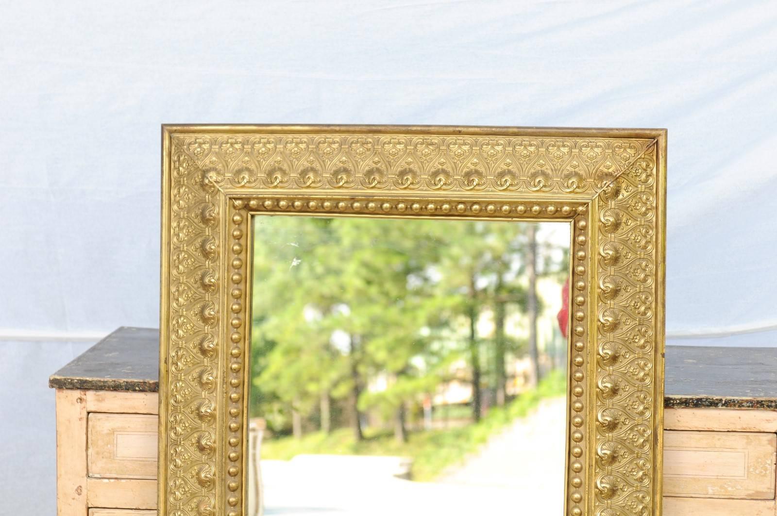 19th Century Dutch Repoussé Brass Beveled Edge Mirror with Heart Motifs, circa 1880 For Sale