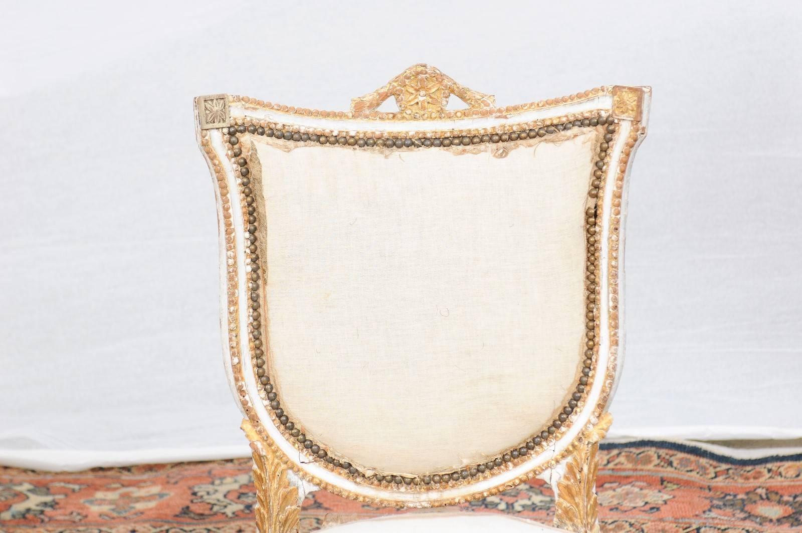 Gilt Pair of Italian Neoclassical Painted and Gilded Side Chairs with Shield Backs