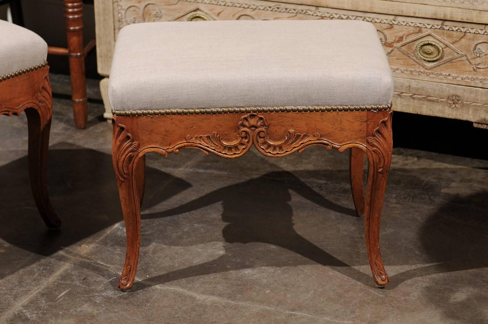20th Century Pair of Rococo Style Italian Carved Walnut Stools with Linen Upholstered Seats