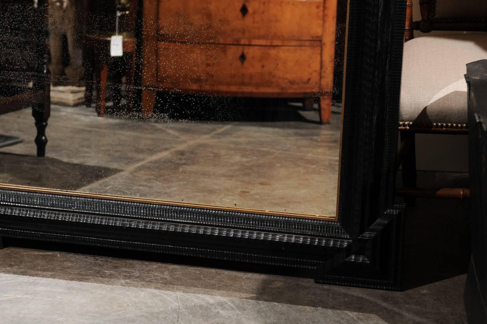 Baroque Large Size Ebonized Wood Dutch Mirror with Notched Frame, circa 1900