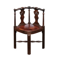 Antique English 1840s Carved Wood Corner Chair with Leather Seat and Cross Stretcher