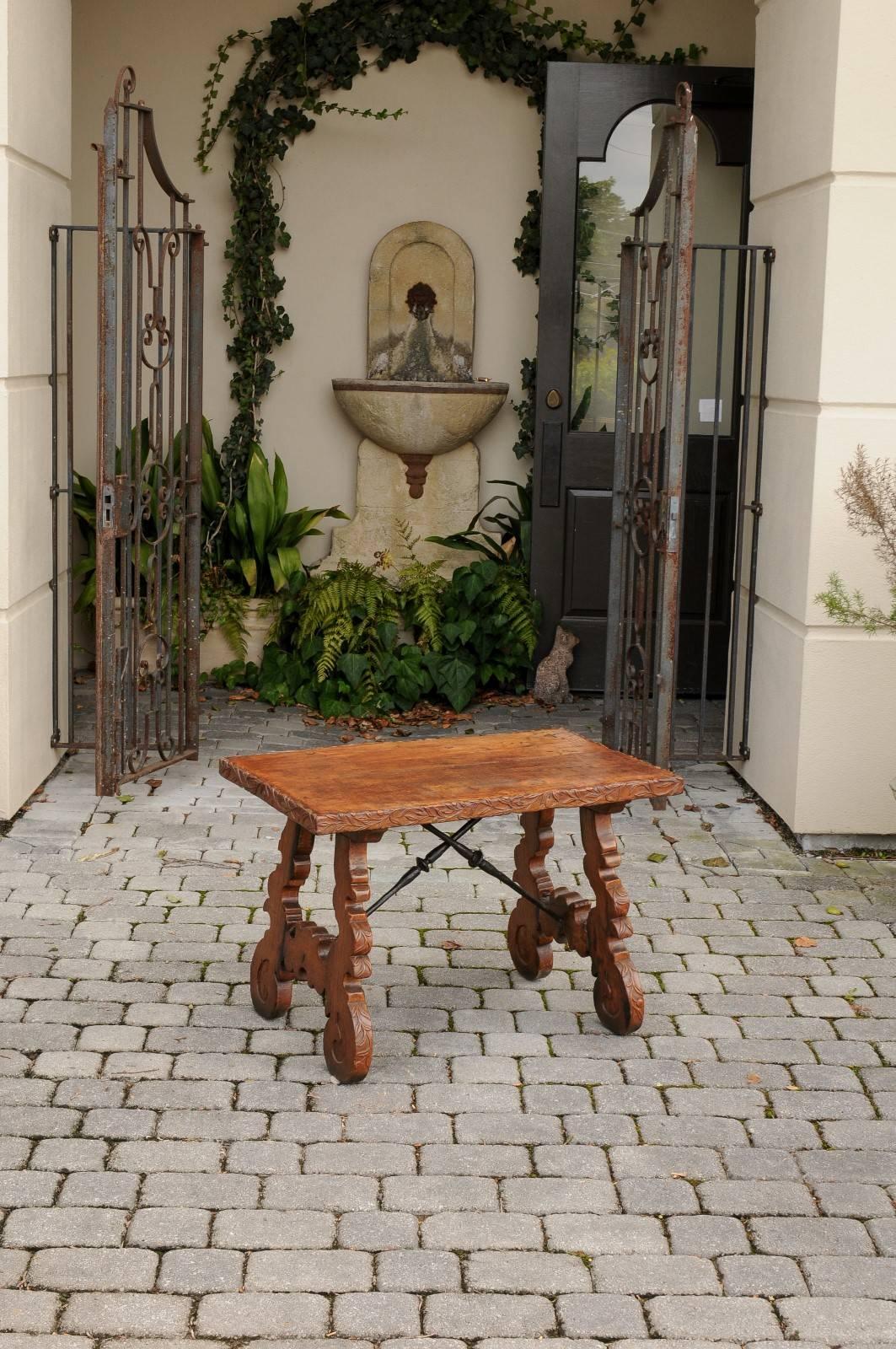 Baroque French 1920s Carved Oak Low Side Table with Iron Stretcher and Lyre-Shaped Legs