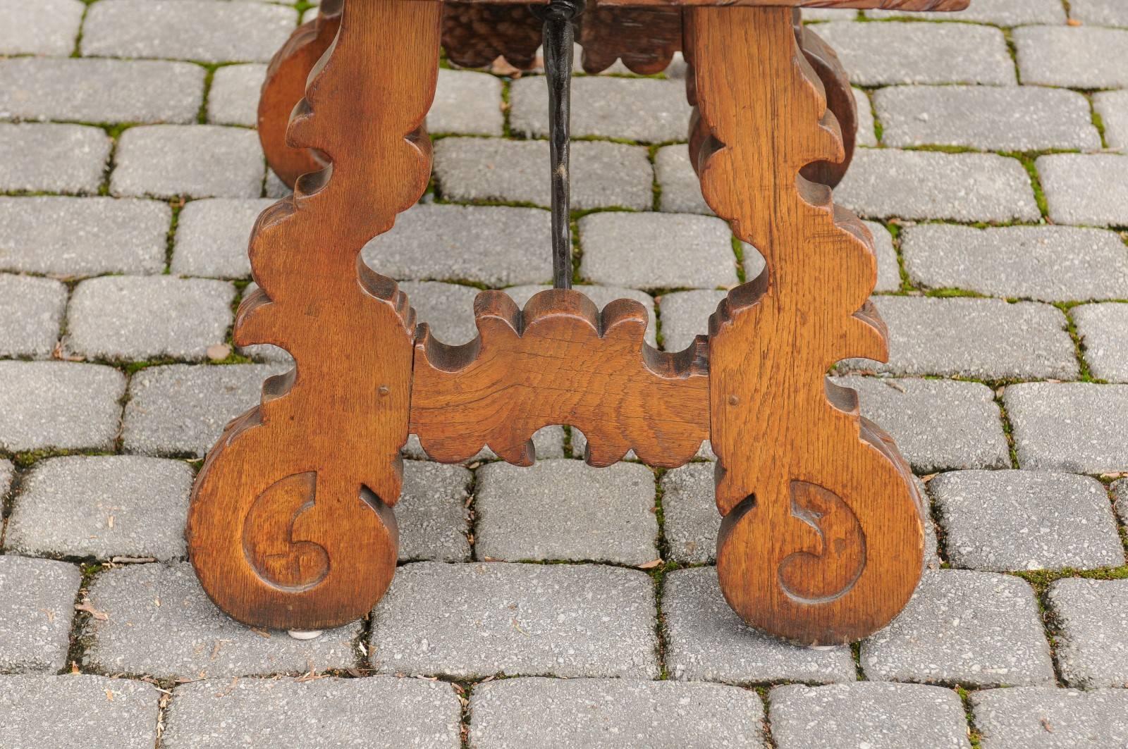 French 1920s Carved Oak Low Side Table with Iron Stretcher and Lyre-Shaped Legs 3