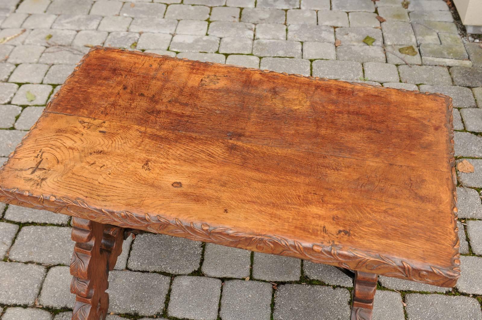 French 1920s Carved Oak Low Side Table with Iron Stretcher and Lyre-Shaped Legs 5