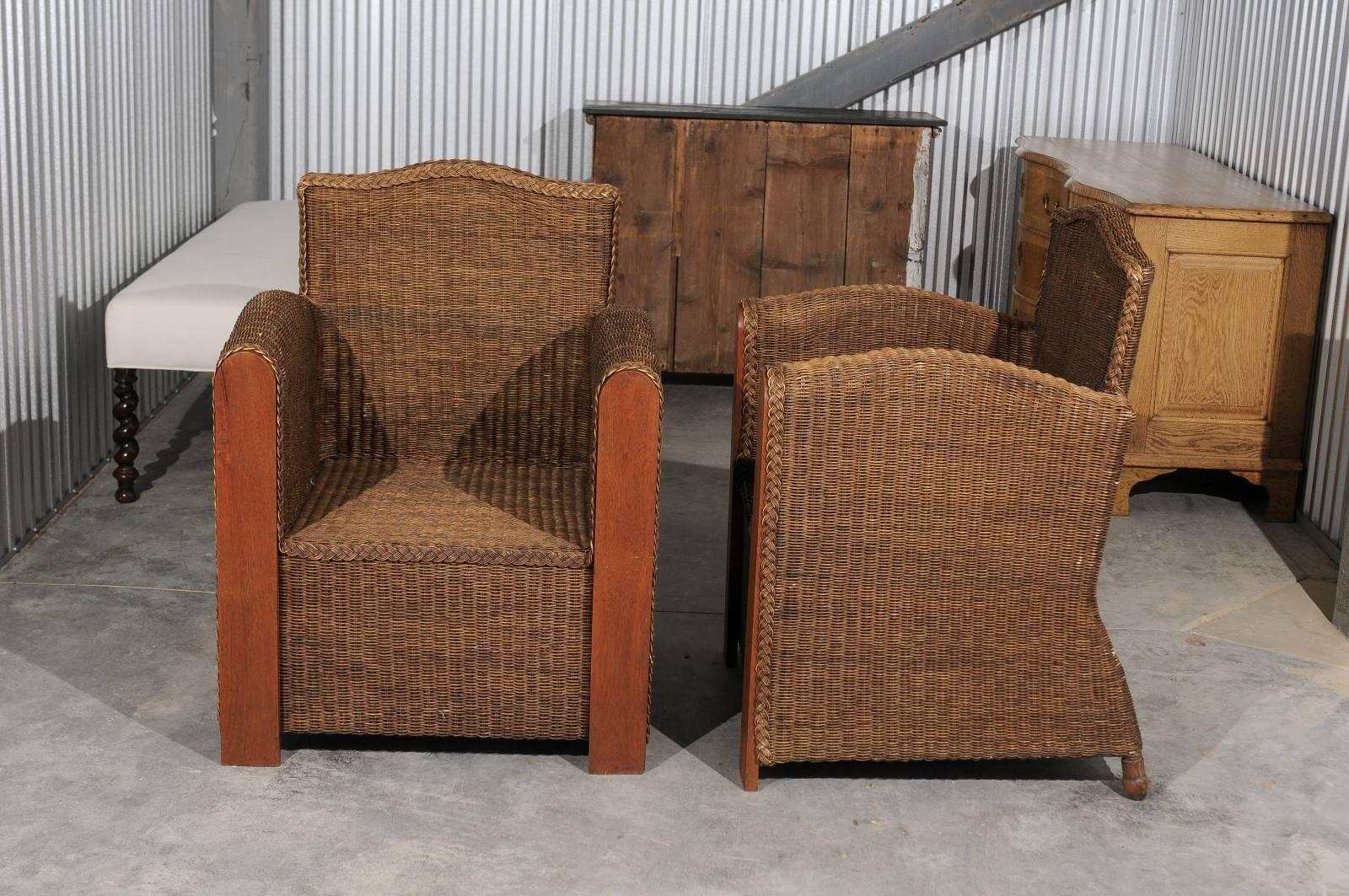 Pair of French Vintage Wicker Club Chairs with Camel Back and Tall Arms For Sale 3