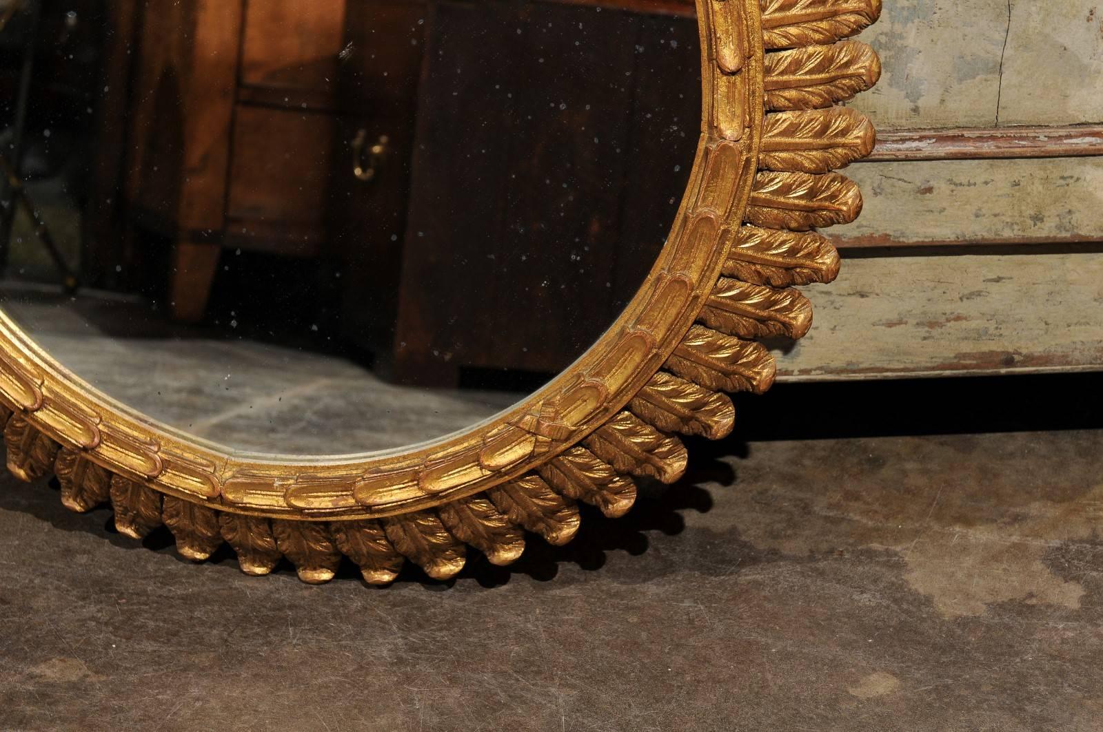 20th Century French Round Giltwood Mirror with Carved Waterleaves and Clear Glass, circa 1950