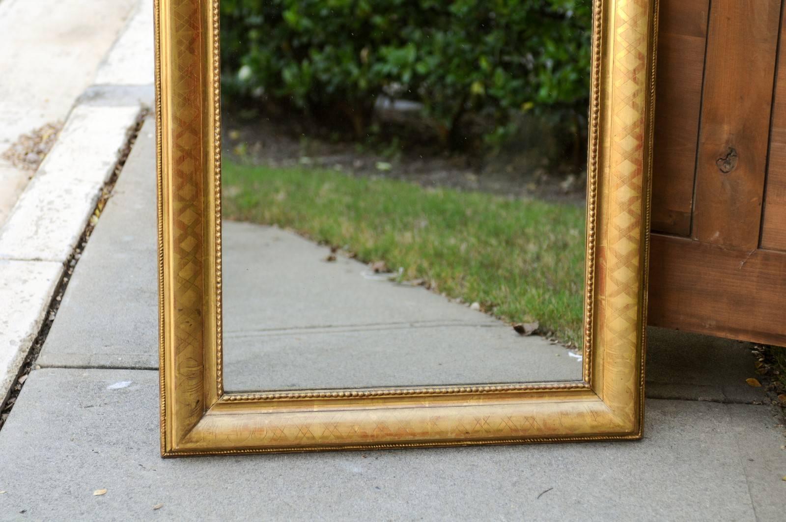 19th Century French Giltwood Louis-Philippe Style Mirror with X-Shaped Motifs, circa 1890