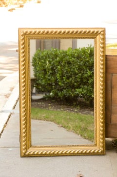 French Rectangular Giltwood Mirror with Gadrooned and Beaded Frame, circa 1900