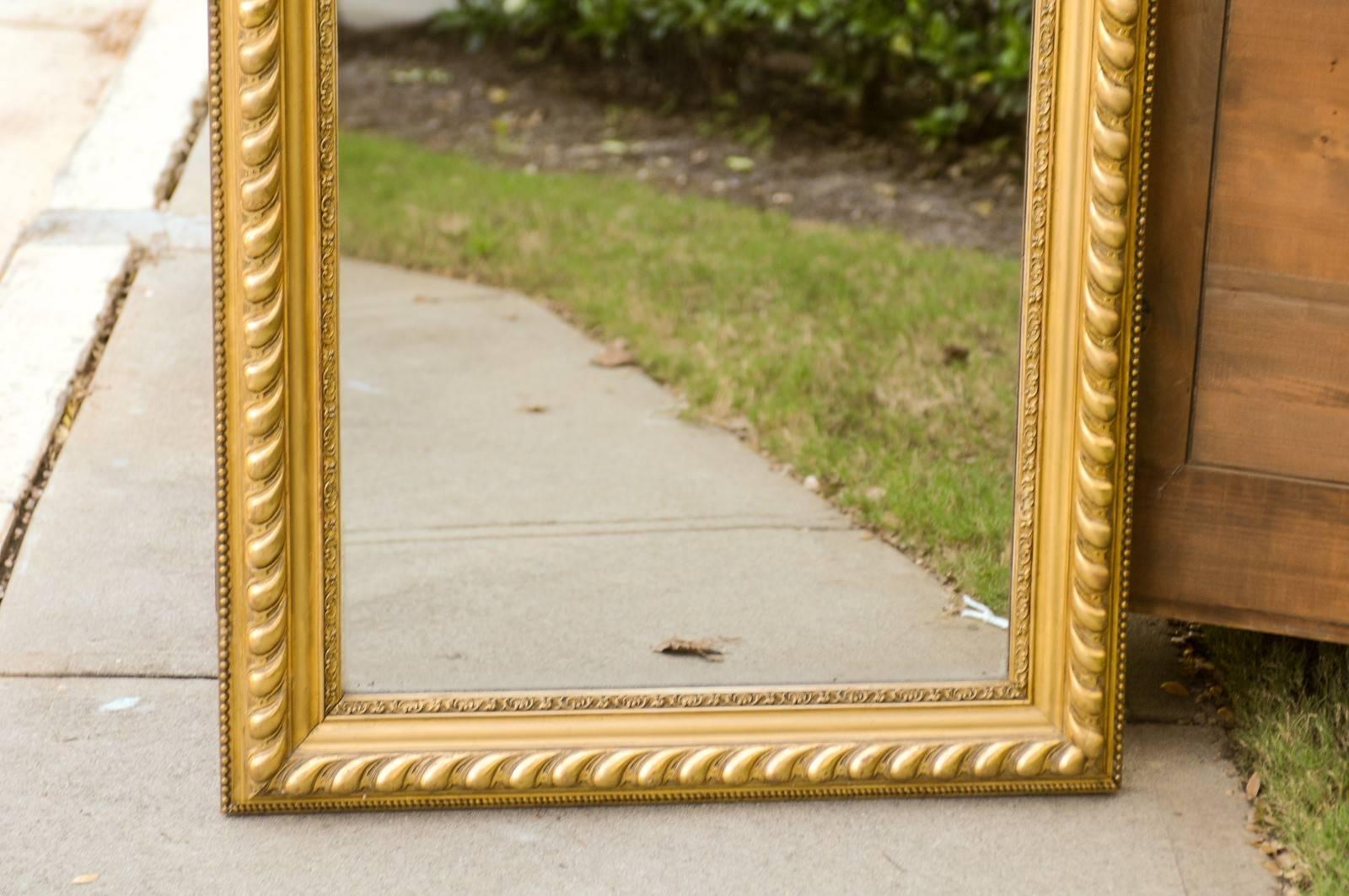 20th Century French Rectangular Giltwood Mirror with Gadrooned and Beaded Frame, circa 1900 For Sale