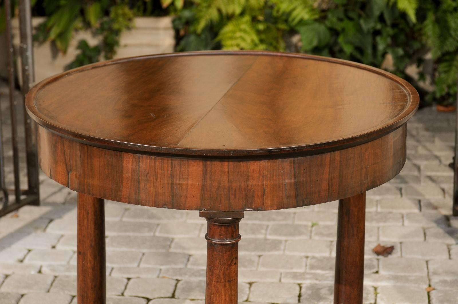 19th Century French 1870s Empire Style Walnut Round Center Table with Column-Shaped Legs
