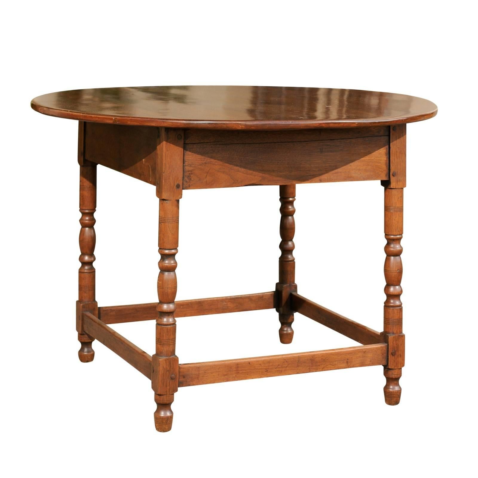 French Walnut Centre Table with Round Top and Turned Legs from the 1880s